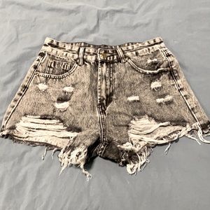 Ripped high-waisted denim shorts